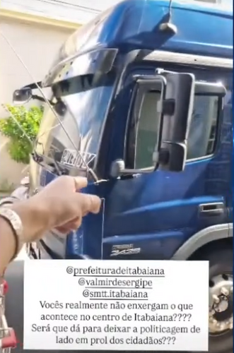 Moradora relata dificuldades para sair de casa devido ao estacionamento de caminhões no centro de Itabaiana